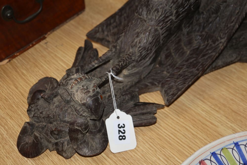 A 19th century Black Forest carved wood heron wall bracket, H.40cm